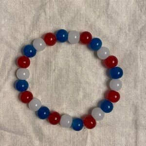 A handmade 4th of July glass bead bracelet
